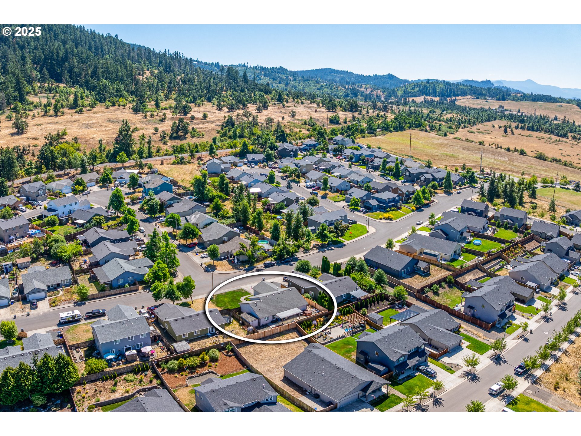 2002 South 60th Street Springfield, OR 97478 - Photo 43 of 47 an aerial view of residential houses with outdoor space