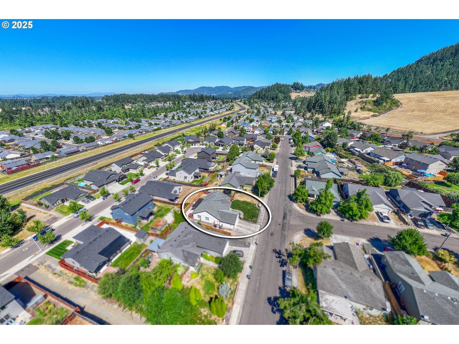2002 South 60th Street Springfield, OR 97478 - Photo 45 of 47 a view of a city with tall buildings