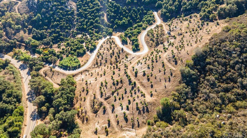 30580 Luis Rey Heights Road Bonsall, CA 92084 - Photo 3 of 8 a view of a house with a tree