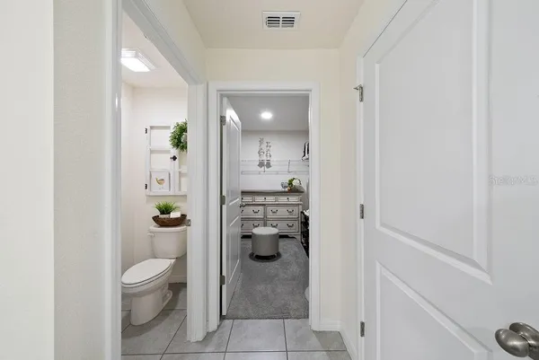 a bathroom with a toilet and a sink