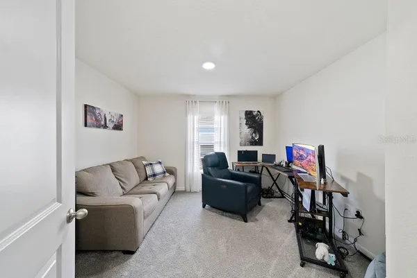a living room with furniture