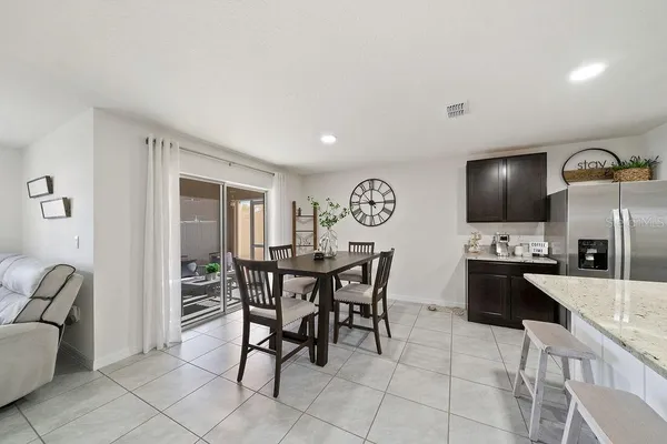 a view of a dining room with furniture