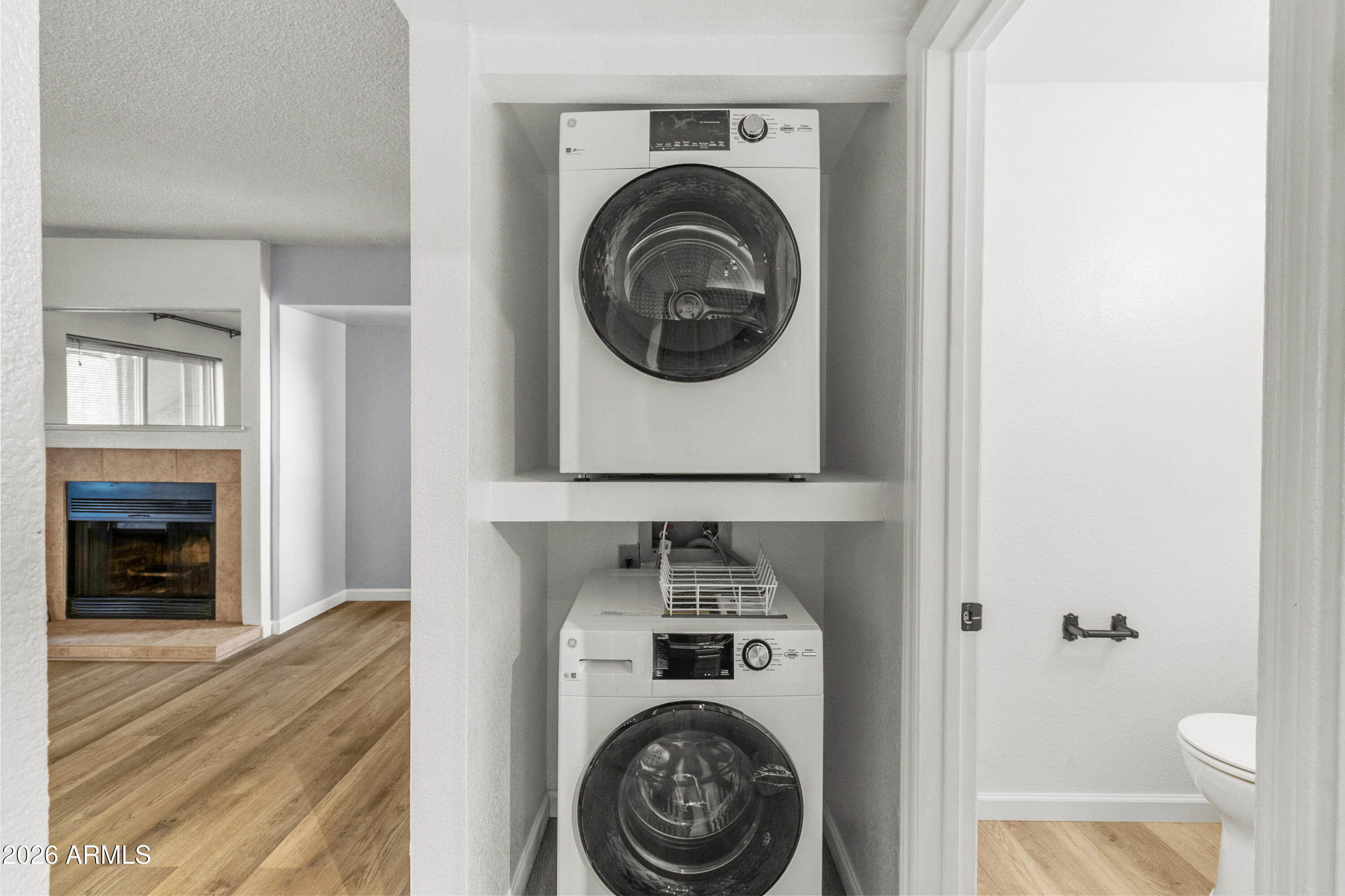 1645 West Baseline Road, Unit 2110 Mesa, AZ 85202 - Photo 5 of 17 a utility room with dryer and washer