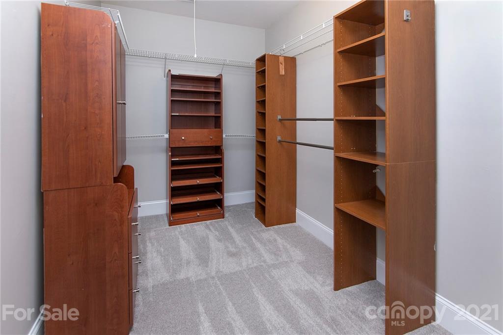 10617 Round Rock Road Charlotte, NC 28277 - Photo 17 of 28 a view of walk in closet with empty racks