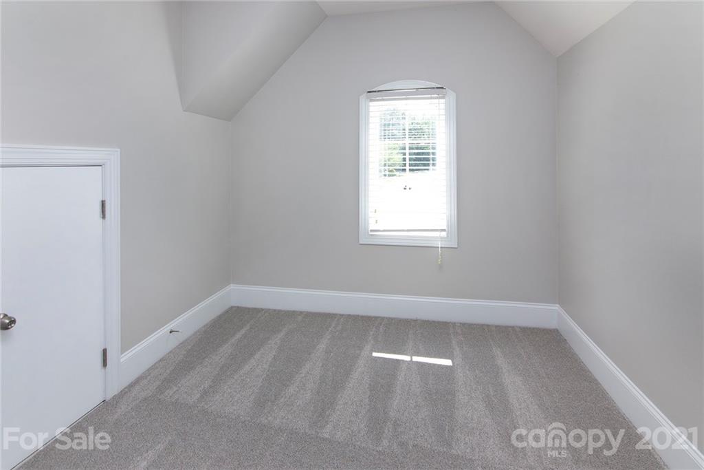 10617 Round Rock Road Charlotte, NC 28277 - Photo 19 of 28 an empty room with a window