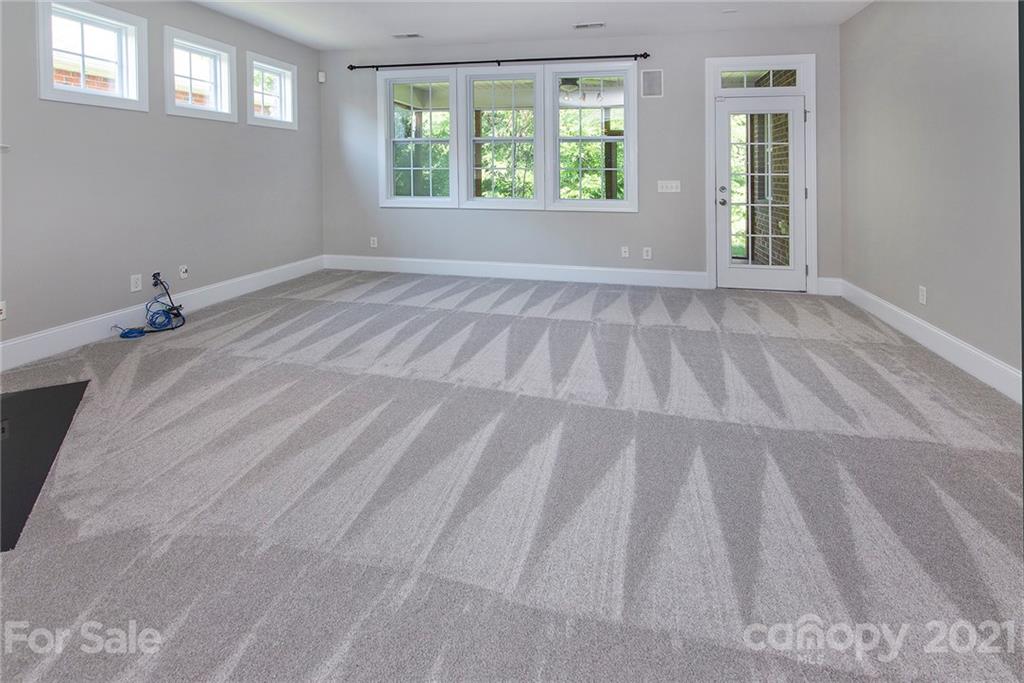 10617 Round Rock Road Charlotte, NC 28277 - Photo 3 of 28 a view of an empty room with a window