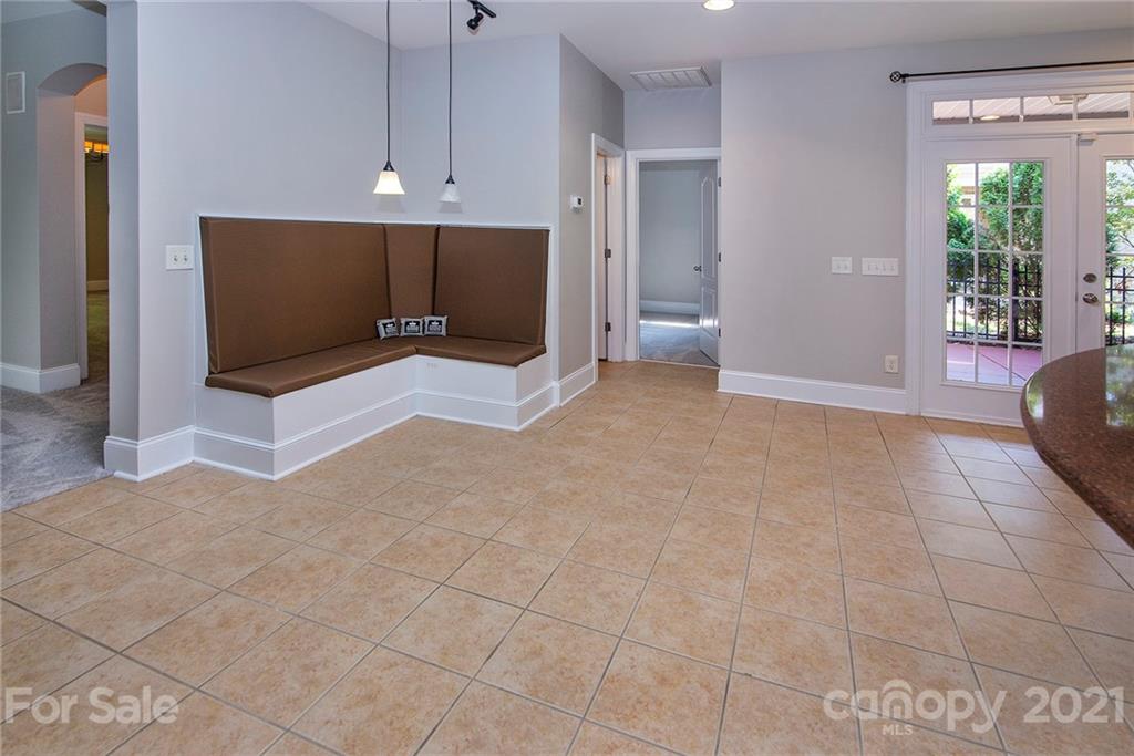 10617 Round Rock Road Charlotte, NC 28277 - Photo 8 of 28 a view of an empty room with a window