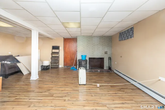 a view of a livingroom with wooden floor