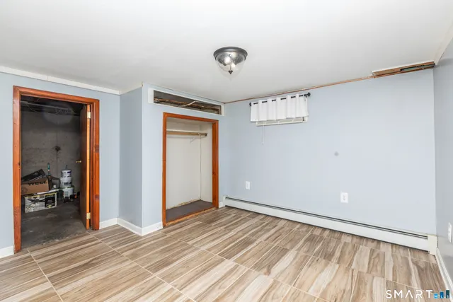 a view of a livingroom with wooden floor