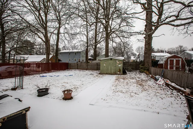 a view of a backyard with a snow