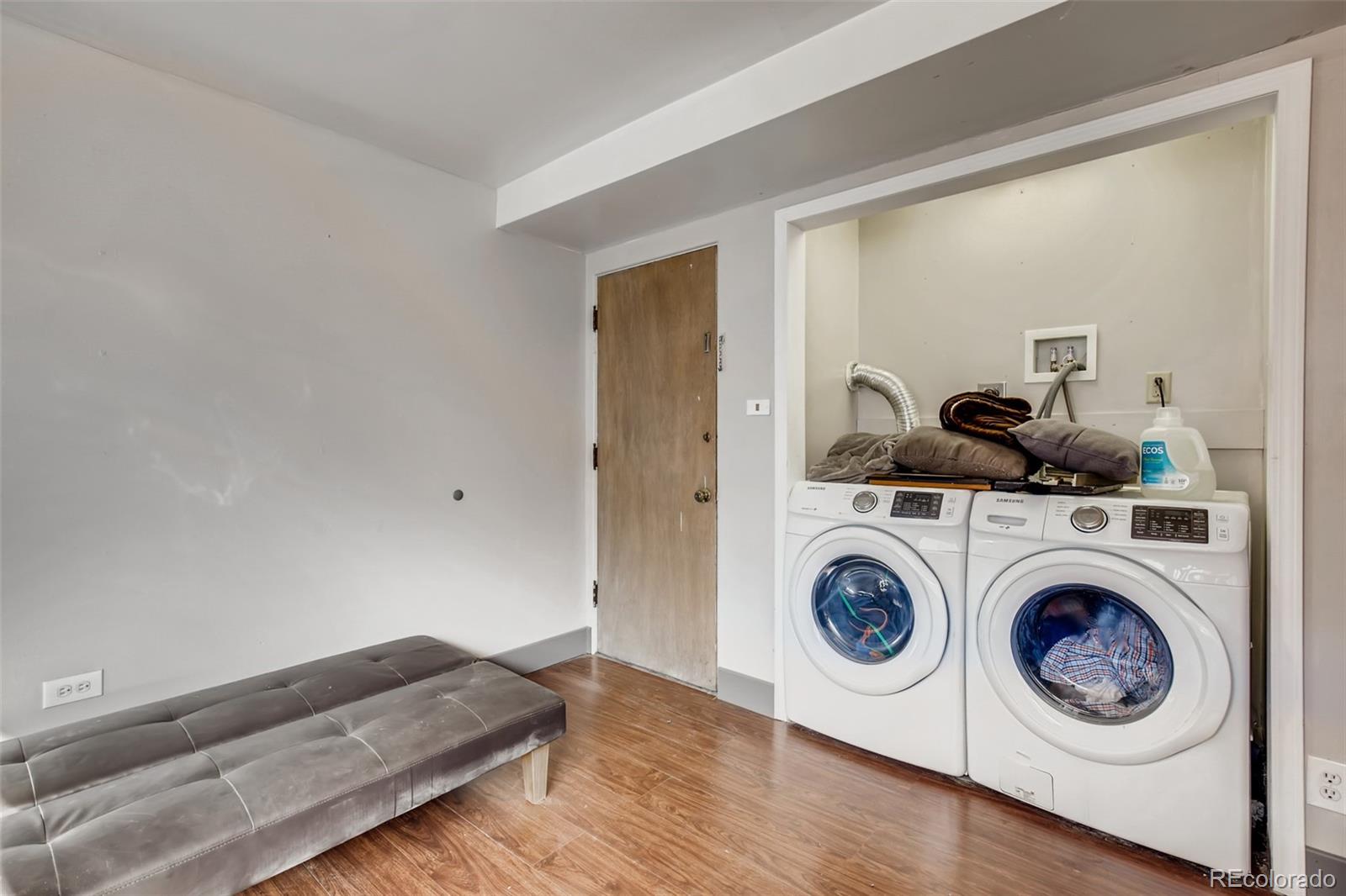 4611 Pierce Street Wheat Ridge, CO 80033 - Photo 24 of 30 a utility room with dryer and washer