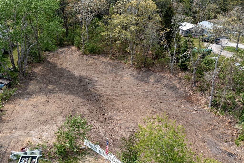 0 George Ryder Road Chatham, MA 02633 - Photo 5 of 7 a view of a forest with trees in the background