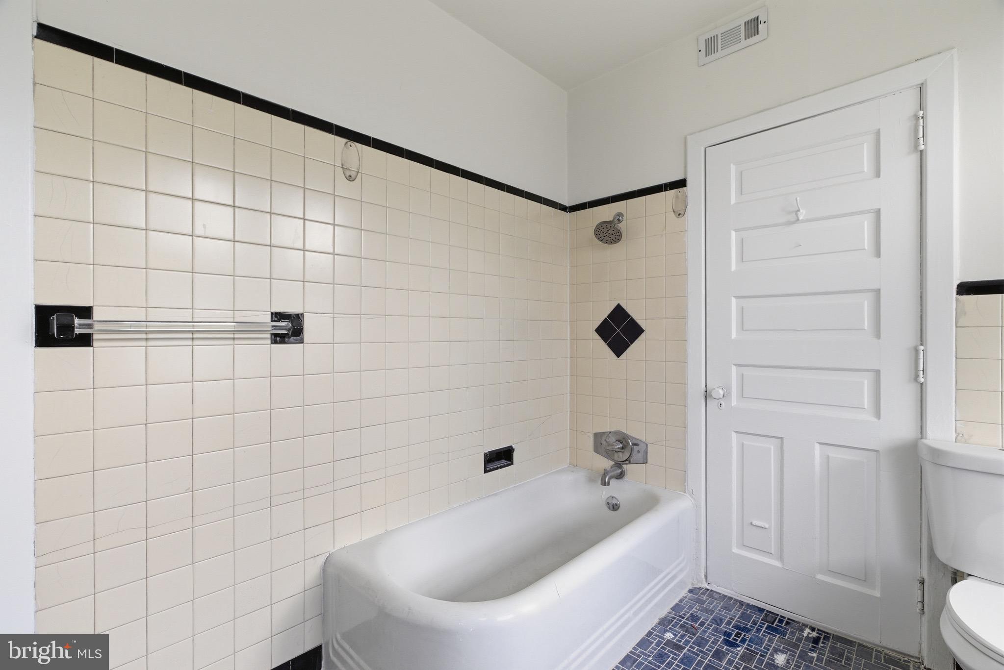 5939 Drexel Road, Unit 2 Philadelphia, PA 19131 - Photo 12 of 17 a bathroom with a bathtub and shower