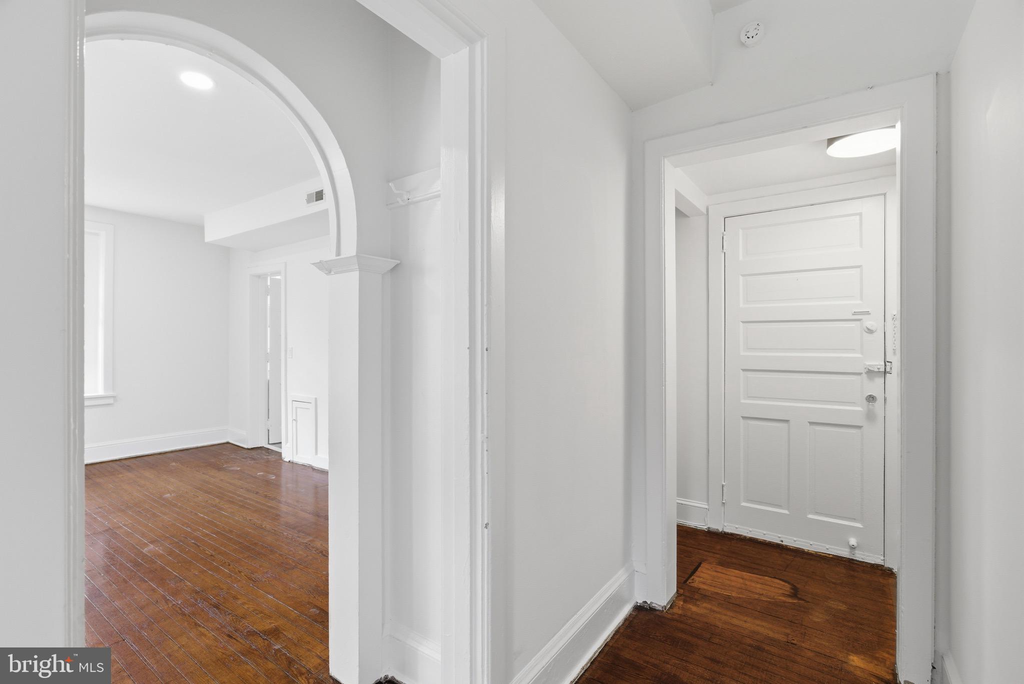 5939 Drexel Road, Unit 2 Philadelphia, PA 19131 - Photo 3 of 17 a view of a hallway with wooden floor
