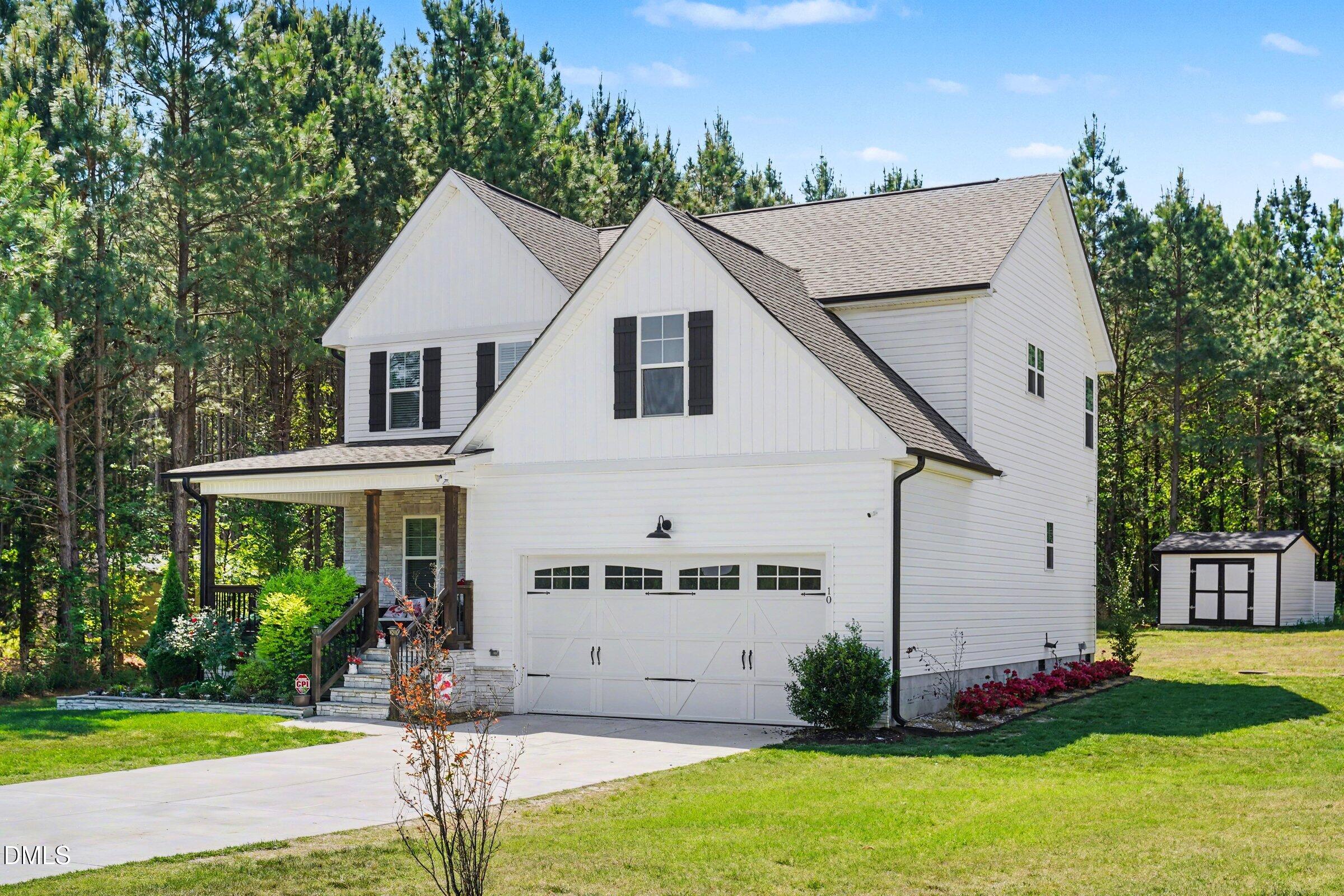 10 Mitchell Rdg Drive Youngsville, NC 27596 - Photo 12 of 38 a view of house with garden