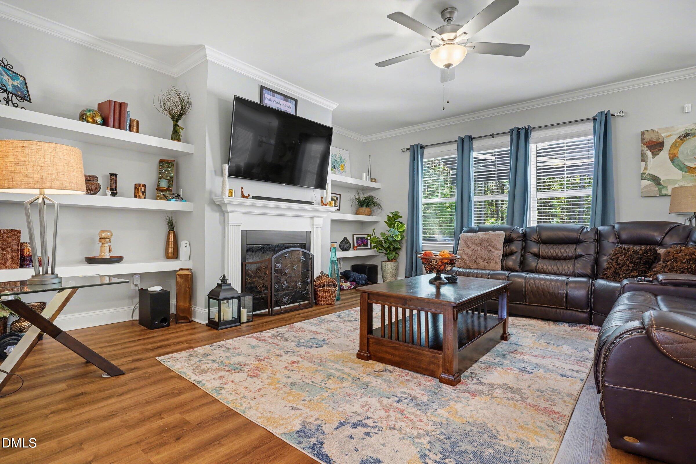 10 Mitchell Rdg Drive Youngsville, NC 27596 - Photo 15 of 38 a living room with furniture and a flat screen tv