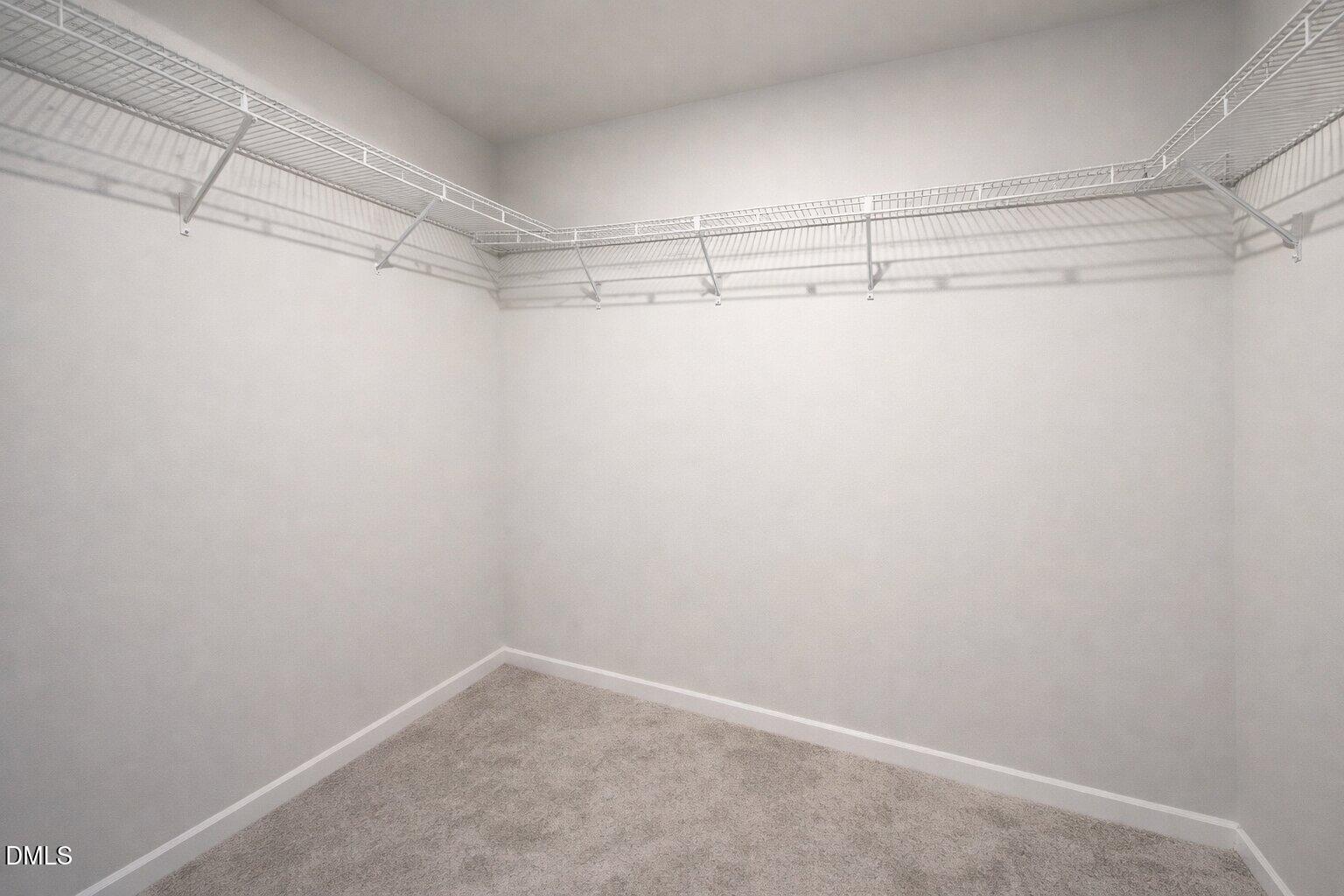 10 Mitchell Rdg Drive Youngsville, NC 27596 - Photo 24 of 38 a view of a room with racks on the wall