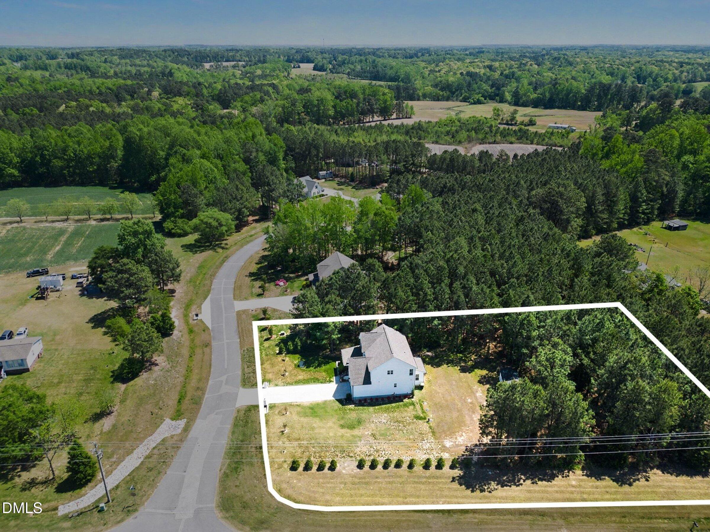 10 Mitchell Rdg Drive Youngsville, NC 27596 - Photo 2 of 38 an aerial view of house with yard swimming pool and outdoor seating