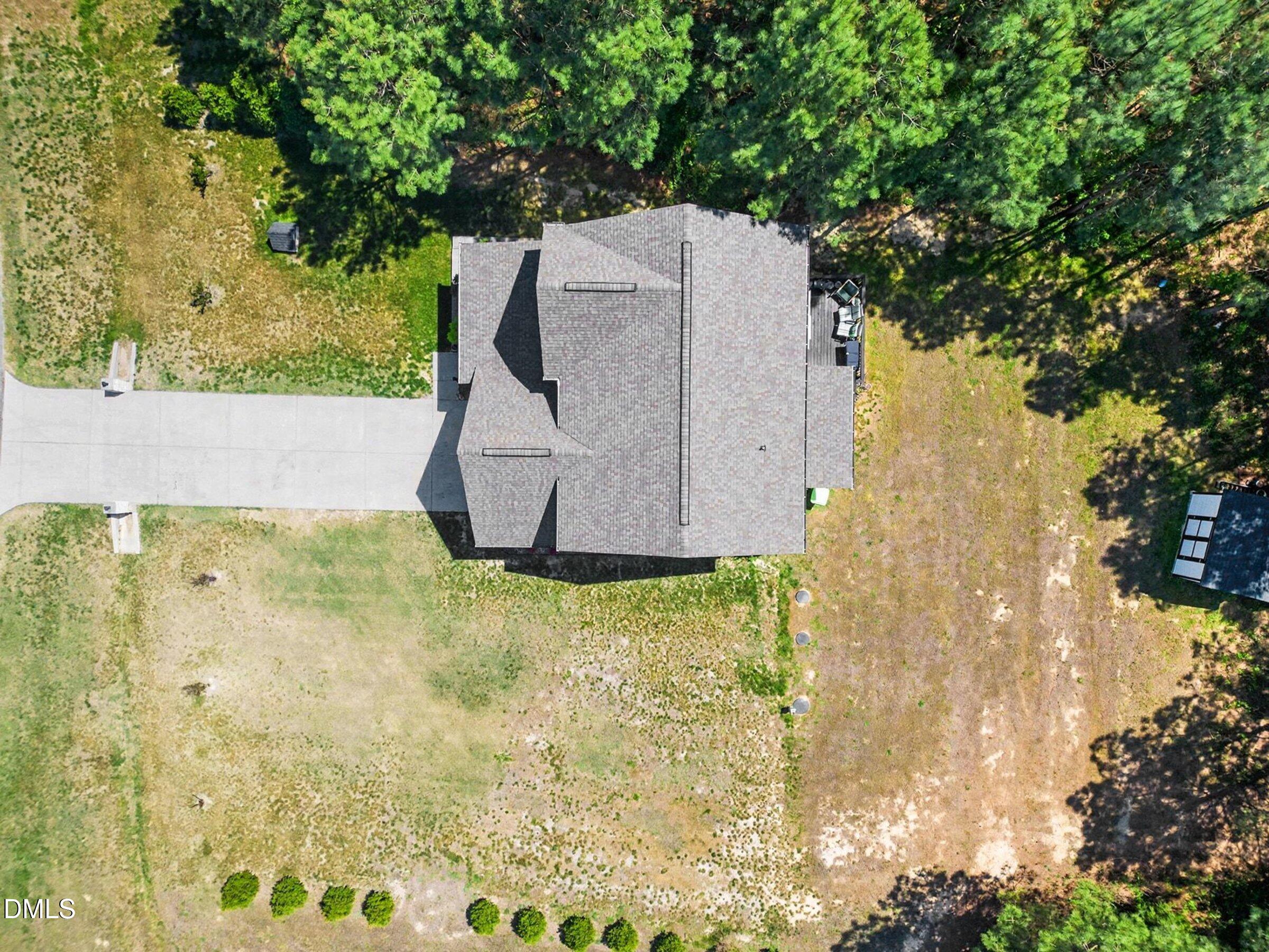 10 Mitchell Rdg Drive Youngsville, NC 27596 - Photo 31 of 38 a house with trees in the background