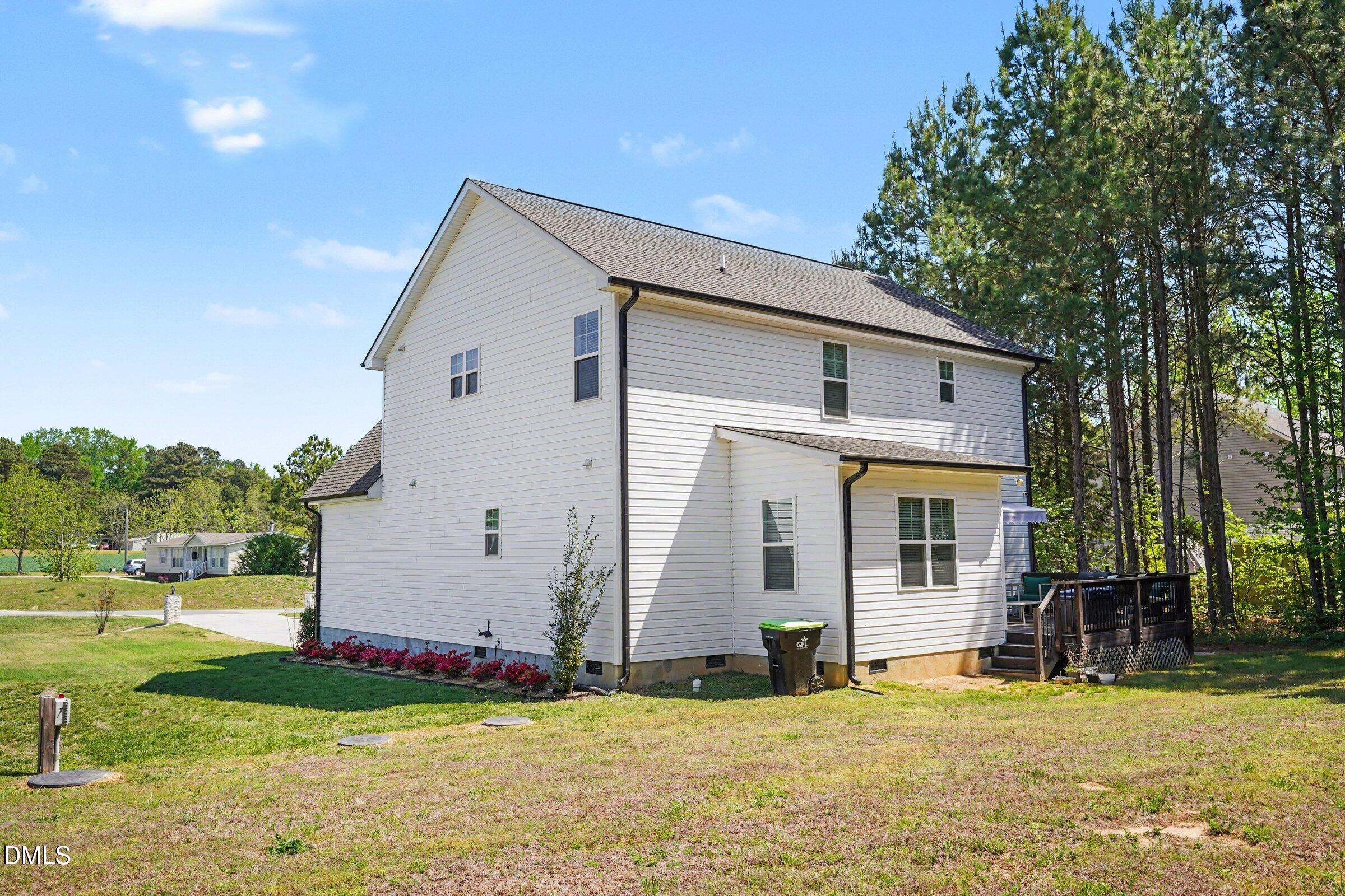 10 Mitchell Rdg Drive Youngsville, NC 27596 - Photo 33 of 38 a view of a house with a yard