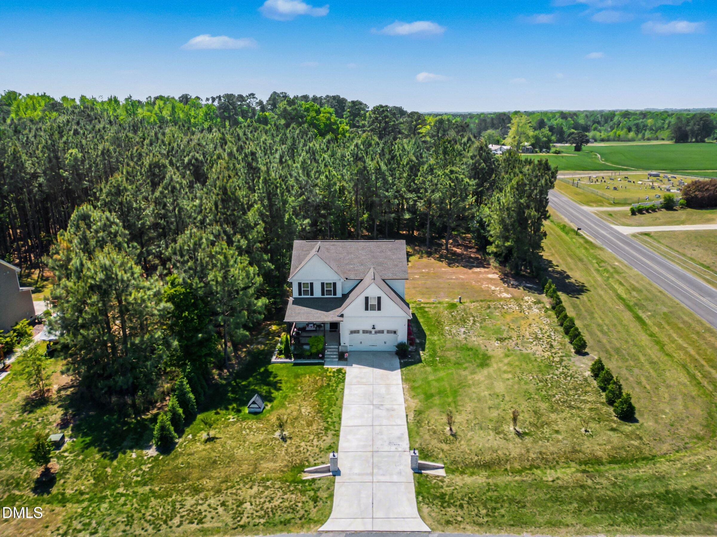 10 Mitchell Rdg Drive Youngsville, NC 27596 - Photo 36 of 38 a aerial view of a house with a yard