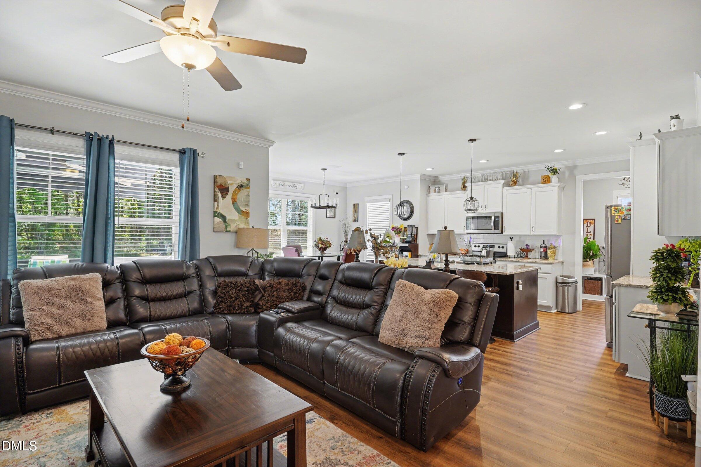 10 Mitchell Rdg Drive Youngsville, NC 27596 - Photo 5 of 38 a living room with furniture and kitchen view