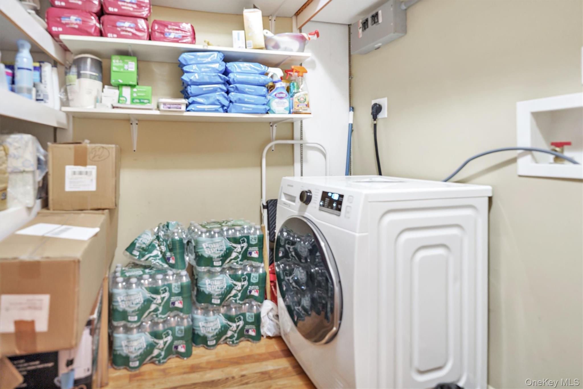200 South Middle Neck Road, Unit J6 Great Neck, NY 11021 - Photo 19 of 22 a utility room with dryer and washer