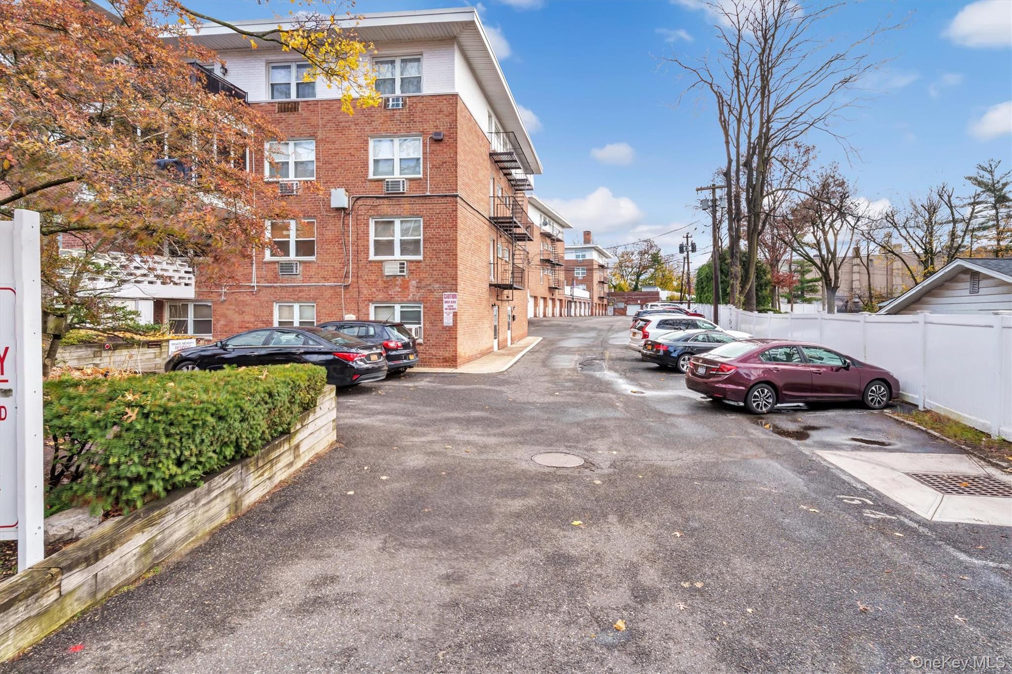 200 South Middle Neck Road, Unit J6 Great Neck, NY 11021 - Photo 21 of 22 a view of a street with cars
