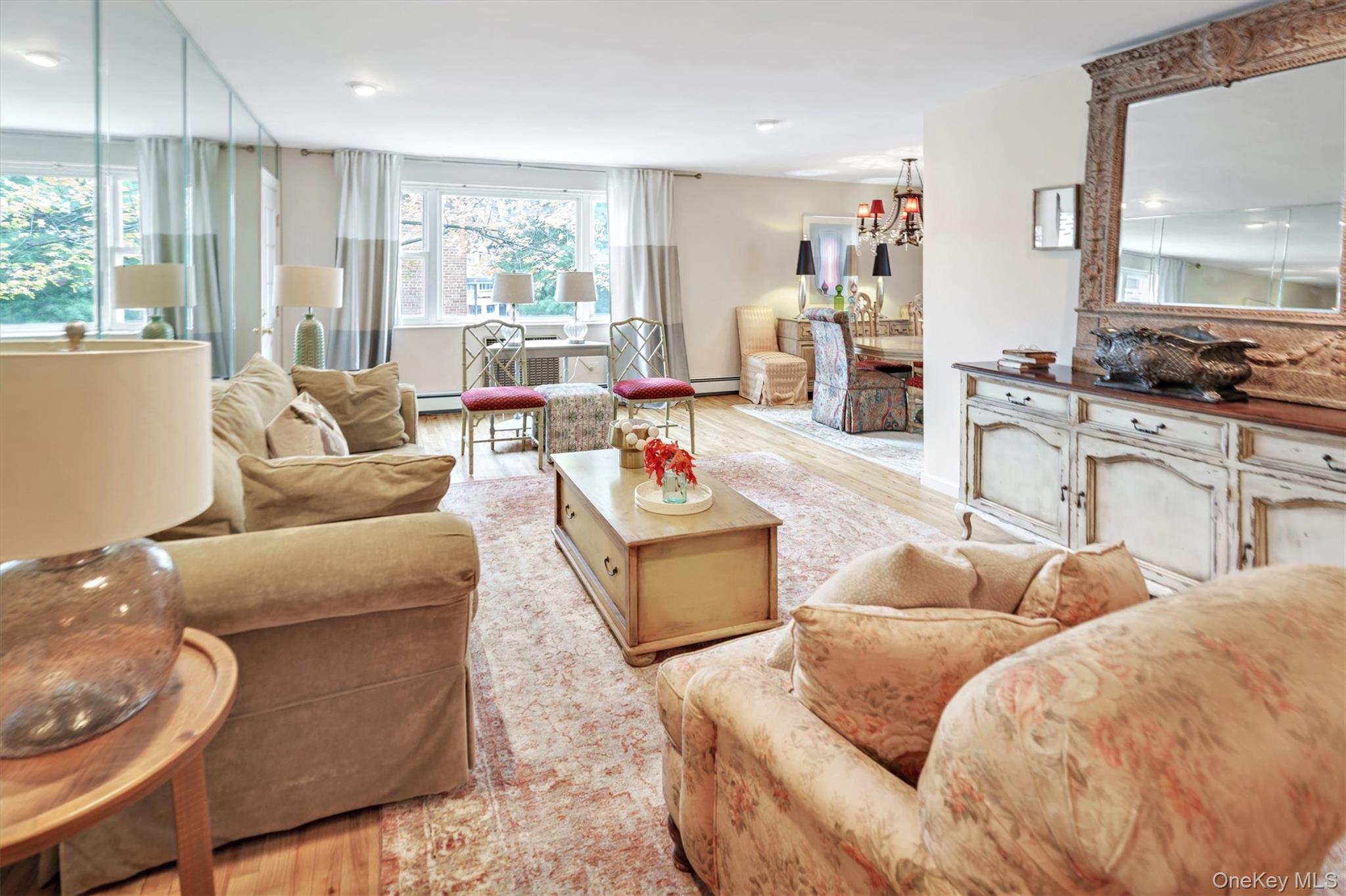 200 South Middle Neck Road, Unit J6 Great Neck, NY 11021 - Photo 5 of 22 a living room with furniture and a large window