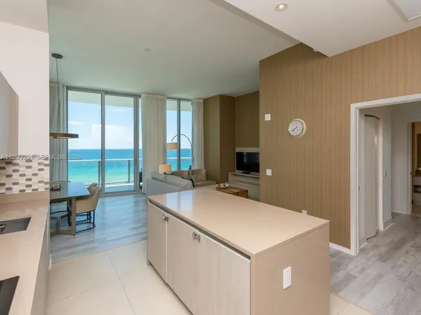 a view of living room with granite countertop furniture and fireplace