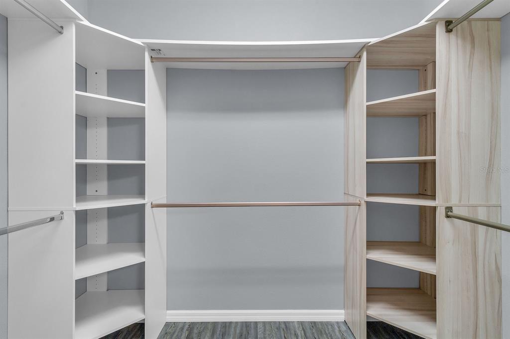 12653 Palapa Loop Spring Hill, FL 34610 - Photo 14 of 33 a close view of closet with wooden floor