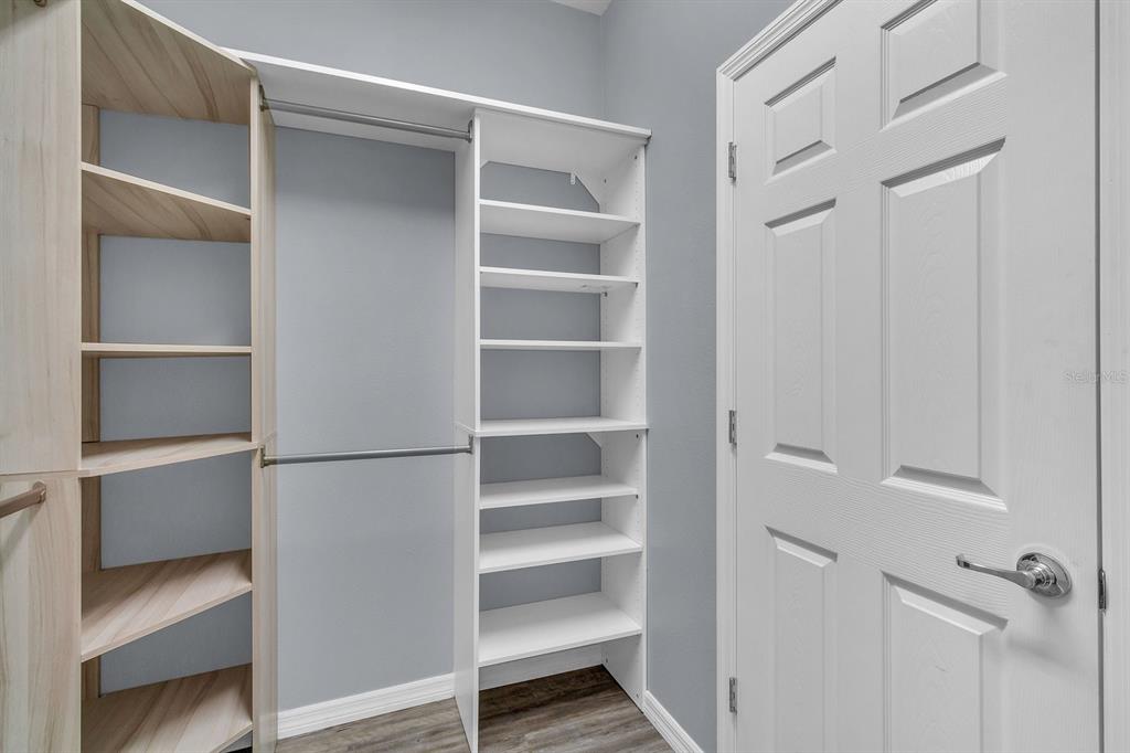 12653 Palapa Loop Spring Hill, FL 34610 - Photo 15 of 33 a view of walk in closet with empty racks