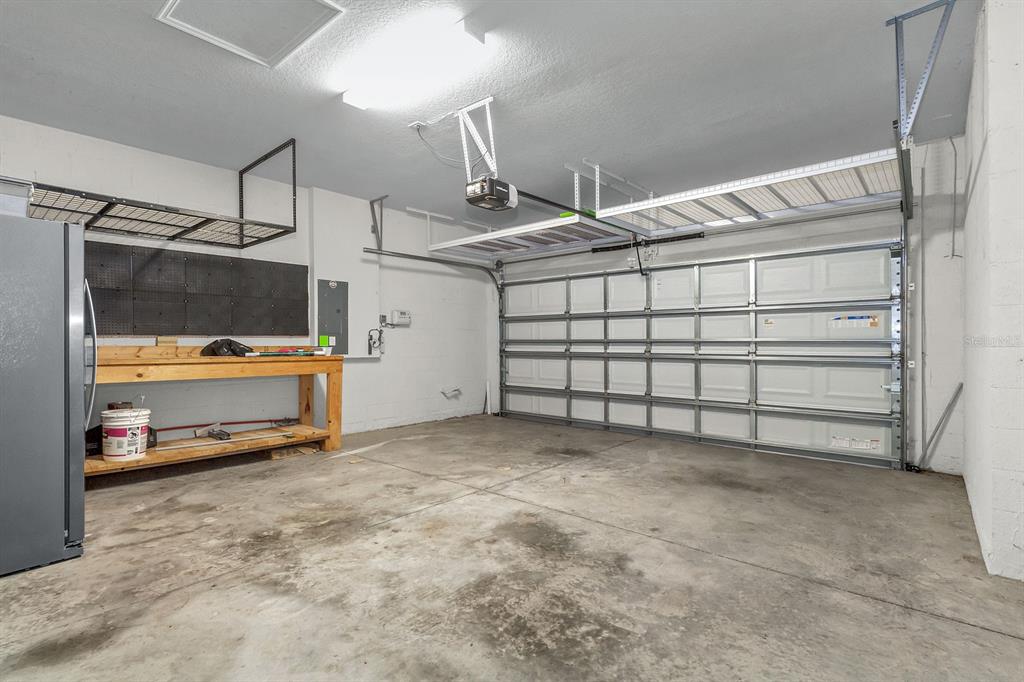 12653 Palapa Loop Spring Hill, FL 34610 - Photo 17 of 33 a view of a garage