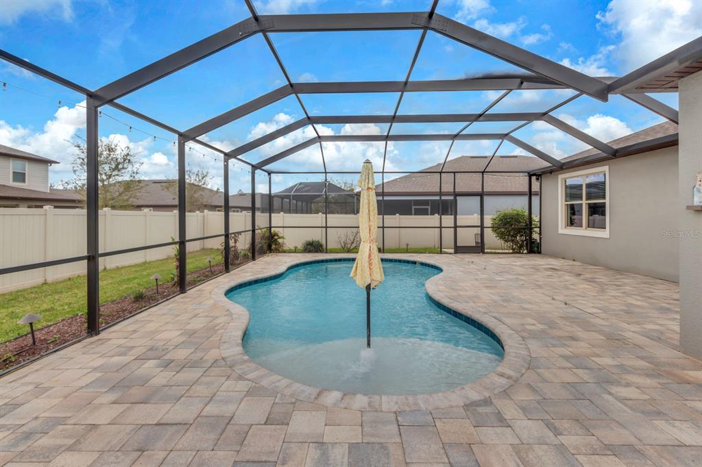 12653 Palapa Loop Spring Hill, FL 34610 - Photo 26 of 33 a view of a backyard