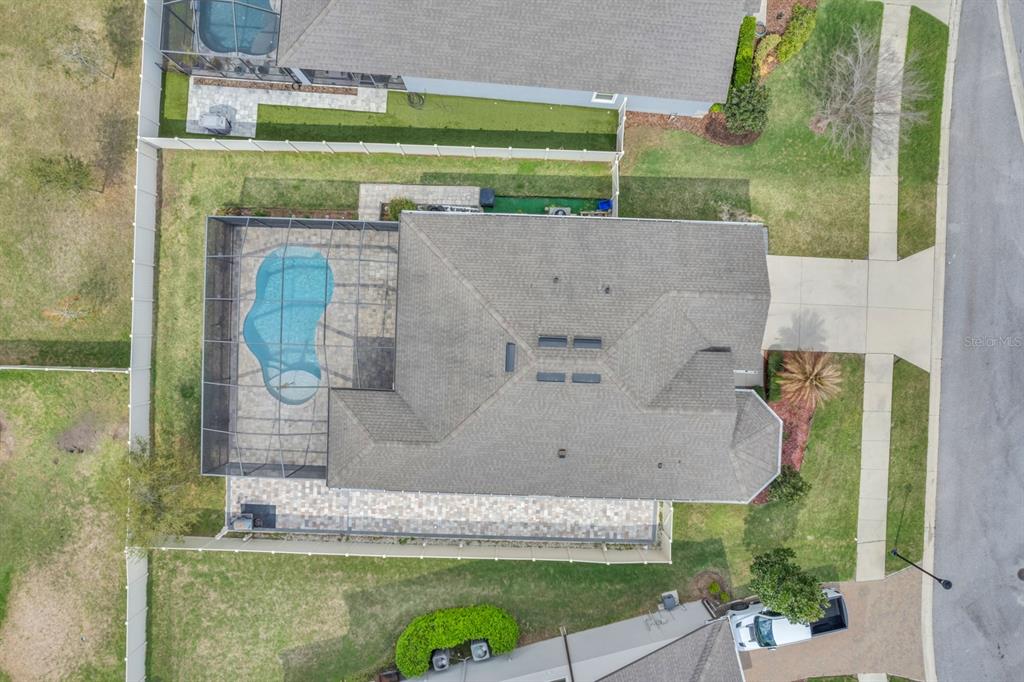 12653 Palapa Loop Spring Hill, FL 34610 - Photo 29 of 33 an aerial view of a house with a yard