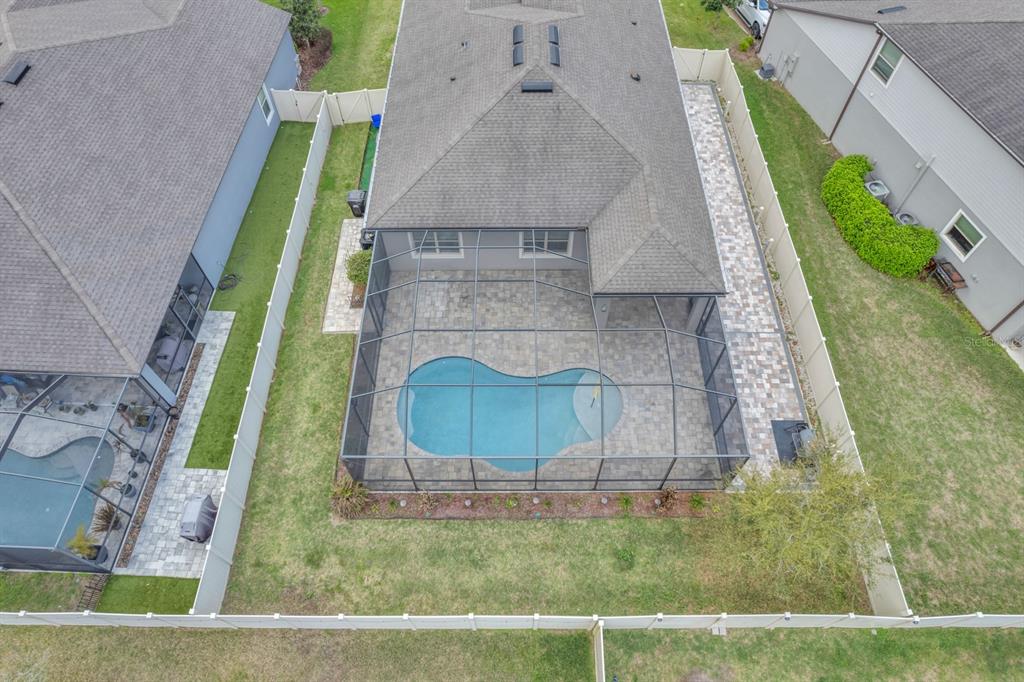 12653 Palapa Loop Spring Hill, FL 34610 - Photo 4 of 33 a aerial view of a house with a yard
