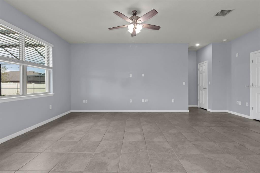 12653 Palapa Loop Spring Hill, FL 34610 - Photo 6 of 33 a view of an empty room with a window