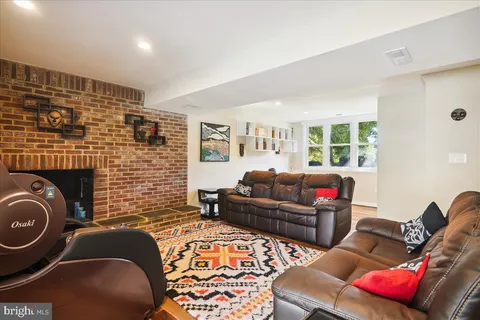 a room with a sink and a mirror