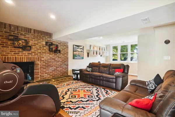 a room with a sink and a mirror