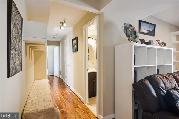 a view of a patio with table and chairs potted plants
