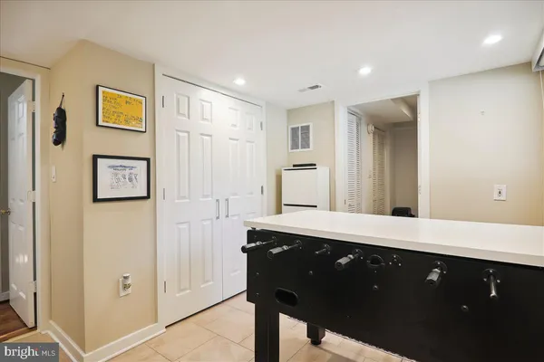 a view of a storage & utility room with a window