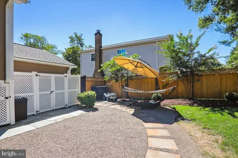 a bedroom with bed and a window