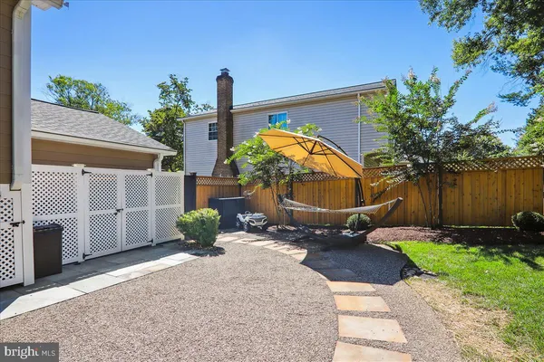 a bedroom with bed and a window