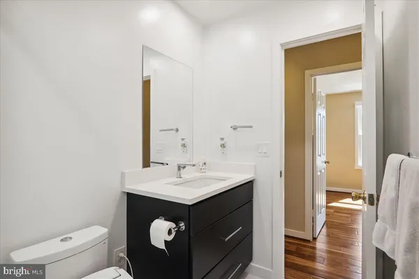 a open kitchen with stainless steel appliances granite countertop a stove and a sink