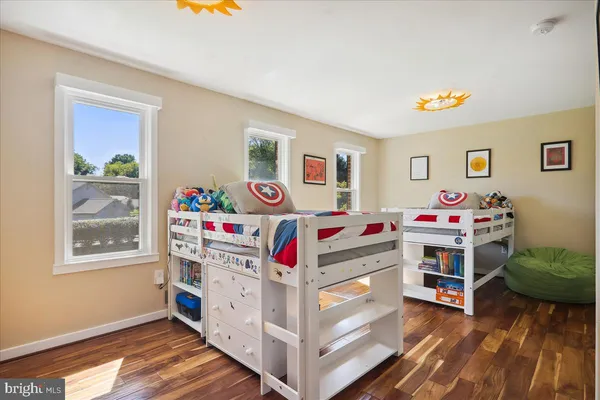 a very nice looking dining room with a large window