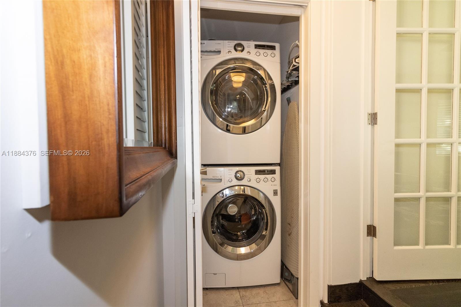 744 Northeast 16th Avenue Fort Lauderdale, FL 33304 - Photo 14 of 26 a utility room with dryer and washer