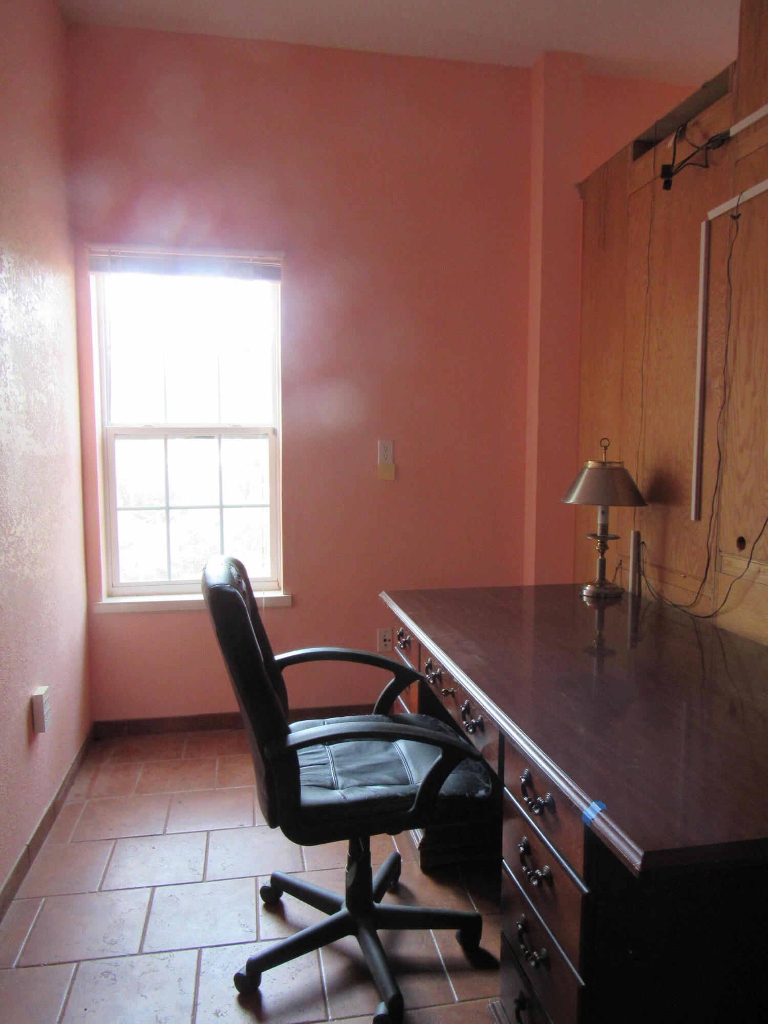 82 Palmetto Street Freeport, FL 32439 - Photo 18 of 55 a room with furniture and window