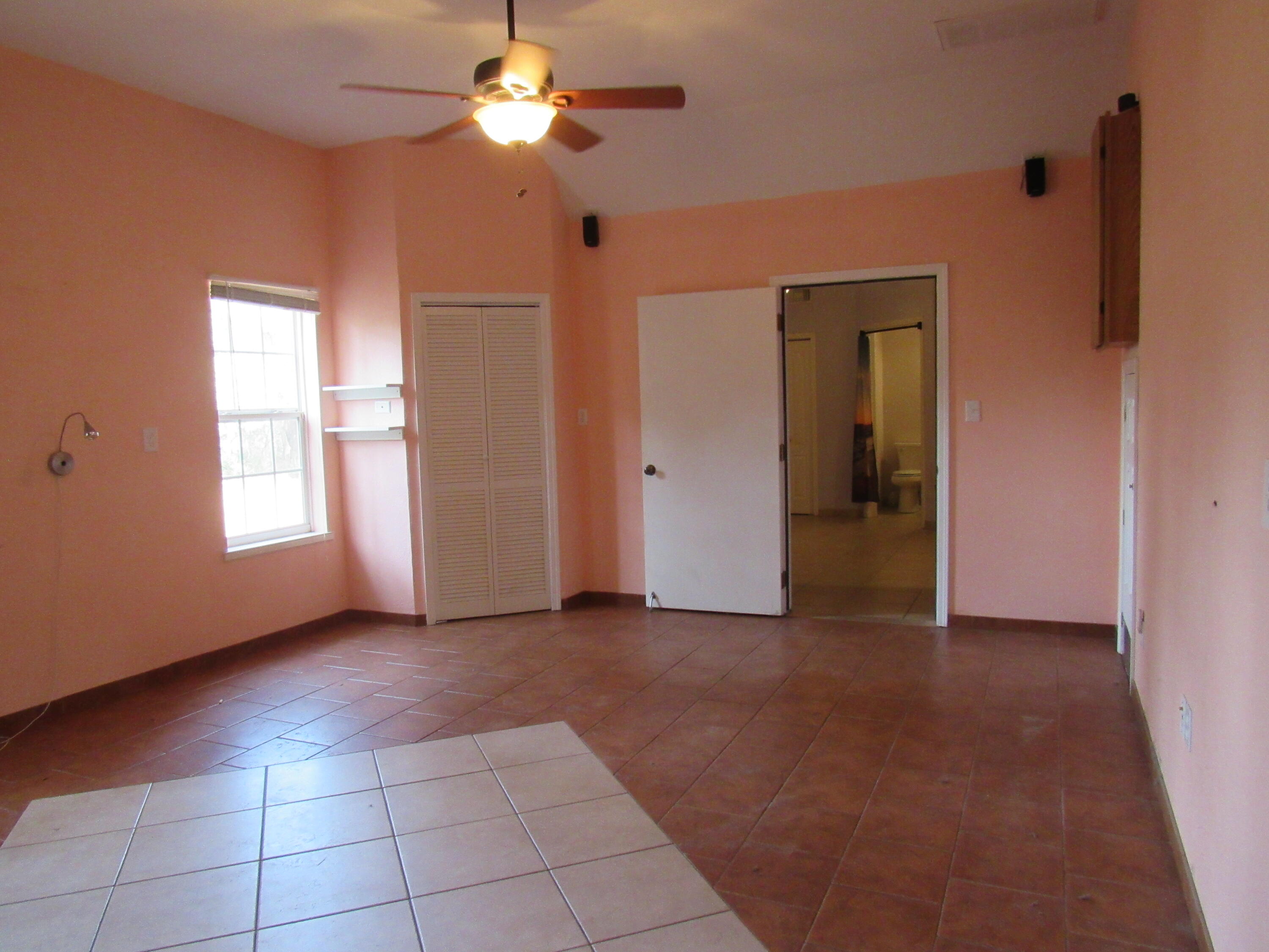 82 Palmetto Street Freeport, FL 32439 - Photo 23 of 55 a view of empty room with window