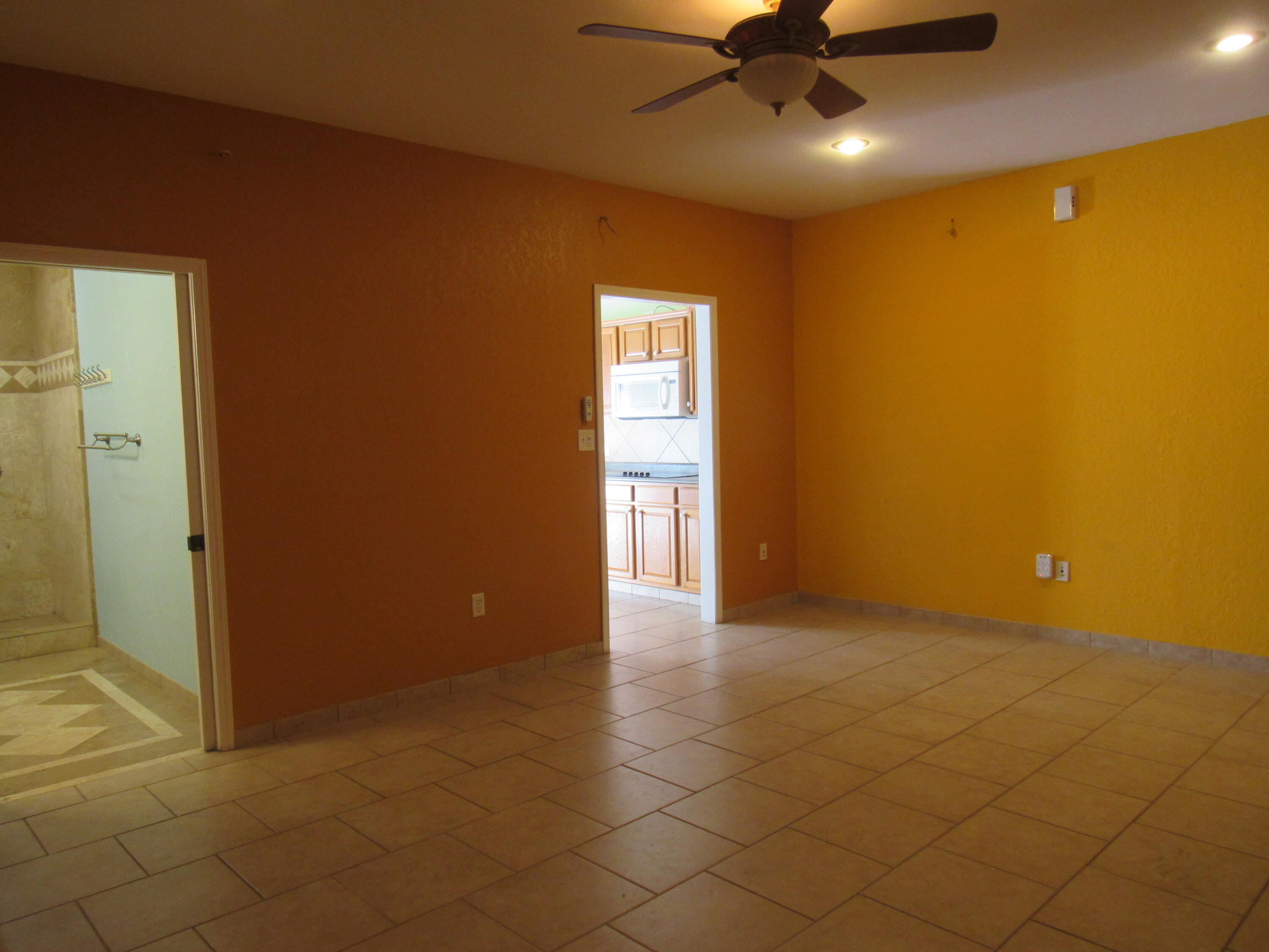 82 Palmetto Street Freeport, FL 32439 - Photo 30 of 55 a view of an empty room with a window