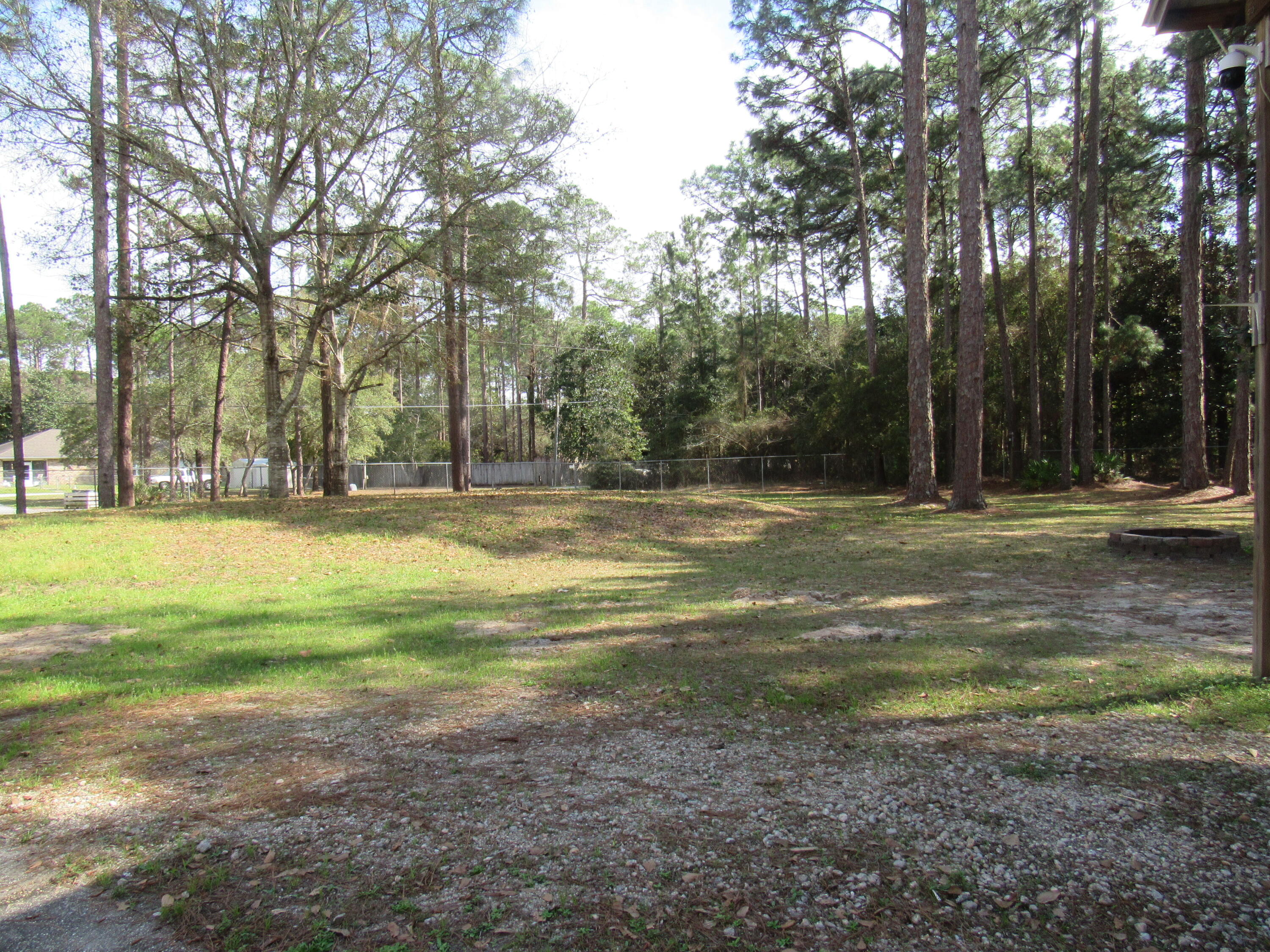 82 Palmetto Street Freeport, FL 32439 - Photo 50 of 55 a view of a park with large trees